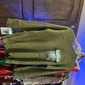 Size small. Olive green sweater with silk pockets and elbow patches.